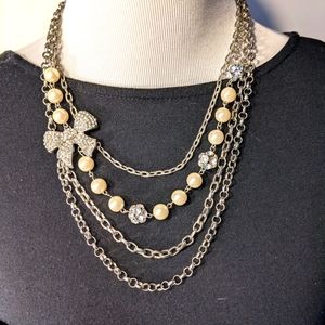 Unique necklace with blingy bow